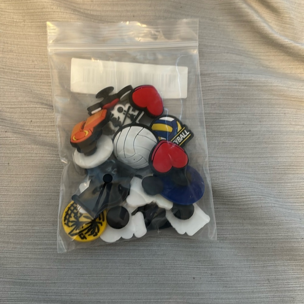 Volleyball croc charms.
